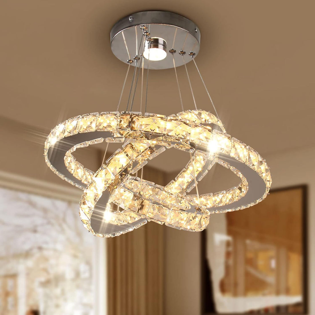 LED ring chandelier in an Australian home, dimmed