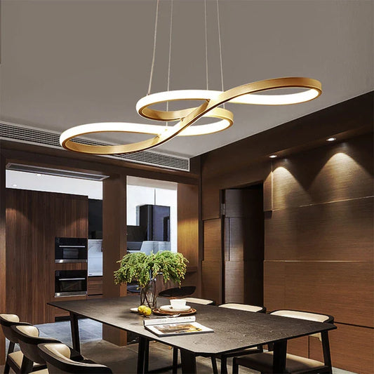Gold and black pendant lights over a Hamptons-style kitchen island in an Australian home