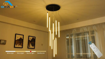 Black 9-light spiral strip LED chandelier in a modern Australian high-ceiling staircase