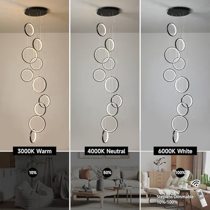Black 10-ring spiral LED chandelier in a modern Australian high-ceiling staircase