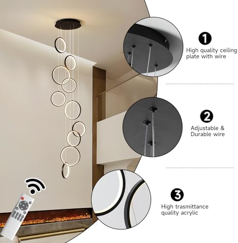 Black 10-ring spiral LED chandelier in a modern Australian high-ceiling staircase