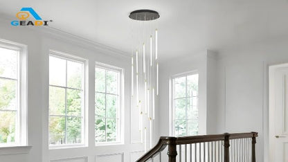 Black 15-light spiral strip LED chandelier in a modern Australian high-ceiling staircase