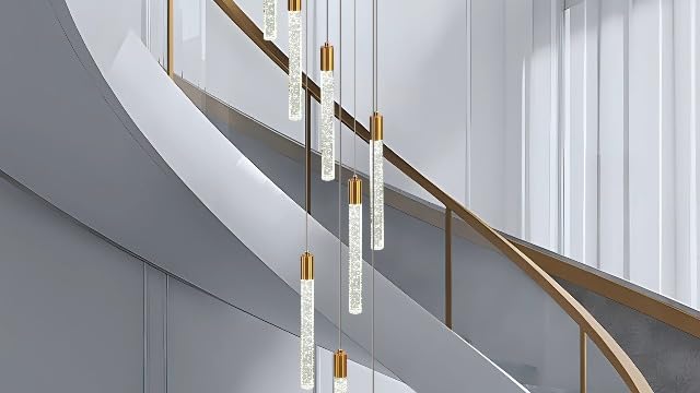 Black 10-light spiral strip LED chandelier in a modern Australian high-ceiling staircase