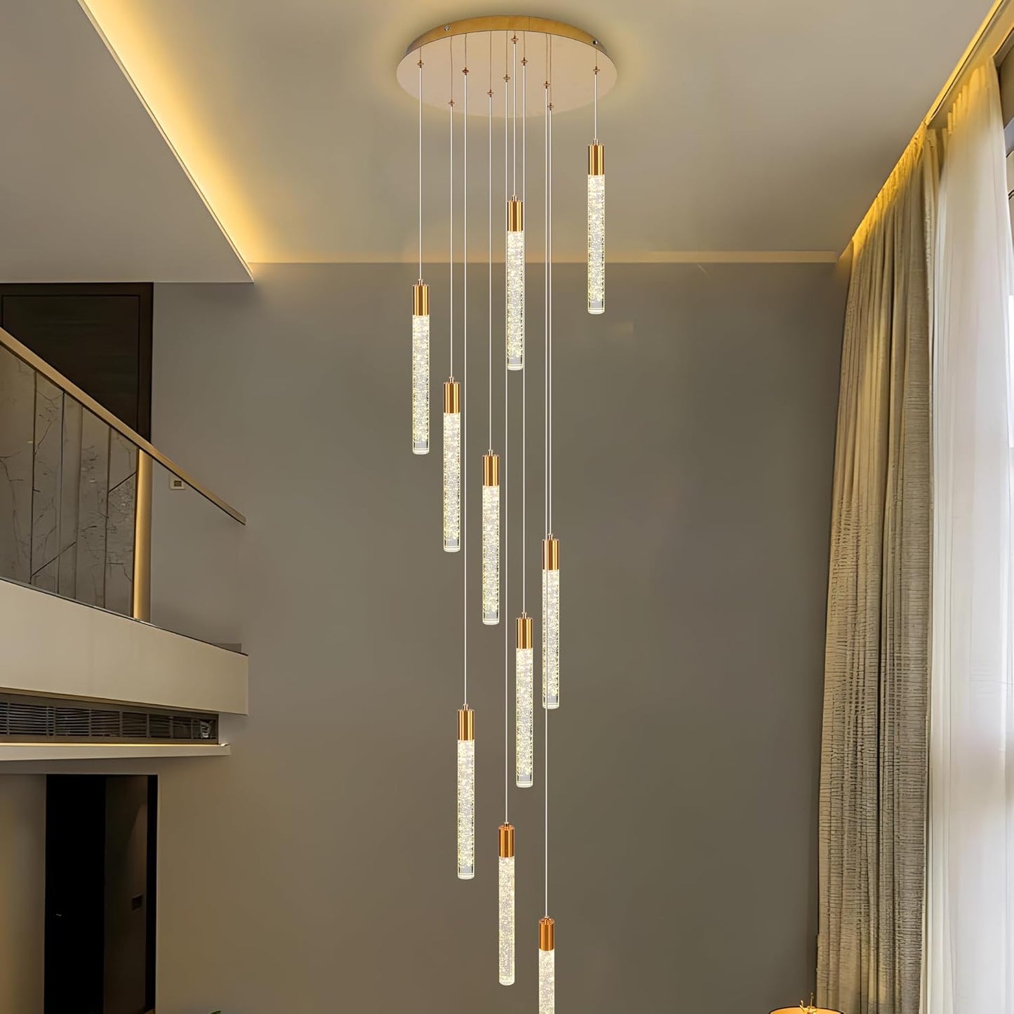 Black 10-light spiral strip LED chandelier in a modern Australian high-ceiling staircase