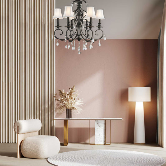 Dark bronze 6-arm Hamptons chandelier hanging above a console table in a styled entryway
