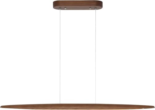Walnut wood linear LED pendant light over a kitchen island in a modern Australian home