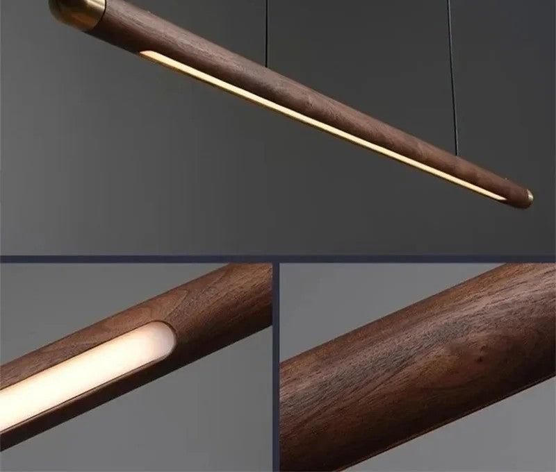Minimalist walnut wood linear LED pendant light over a dining table in a modern Australian home